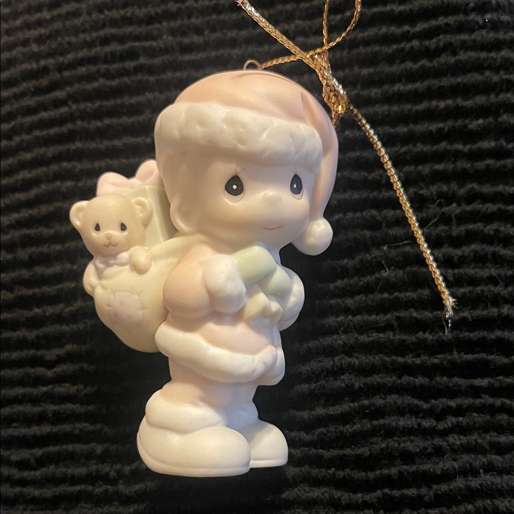 1994 Precious Moments bringing you a Merry